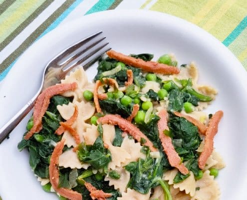 Farfalle met spinazie en erwten